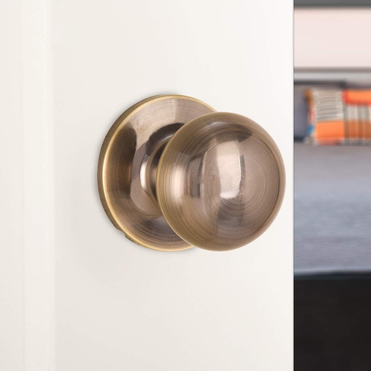 AmazonBasics Closet Door Knob, Round, Antique Brass