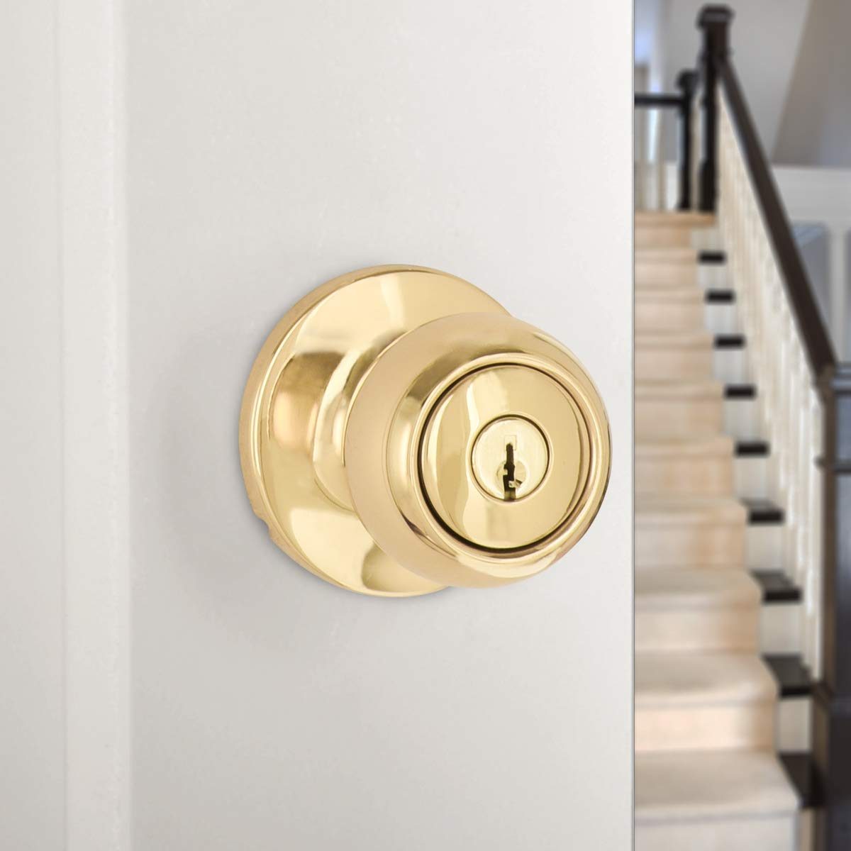 AmazonBasics Exterior Door Knob With Lock, Coastal, Polished Brass