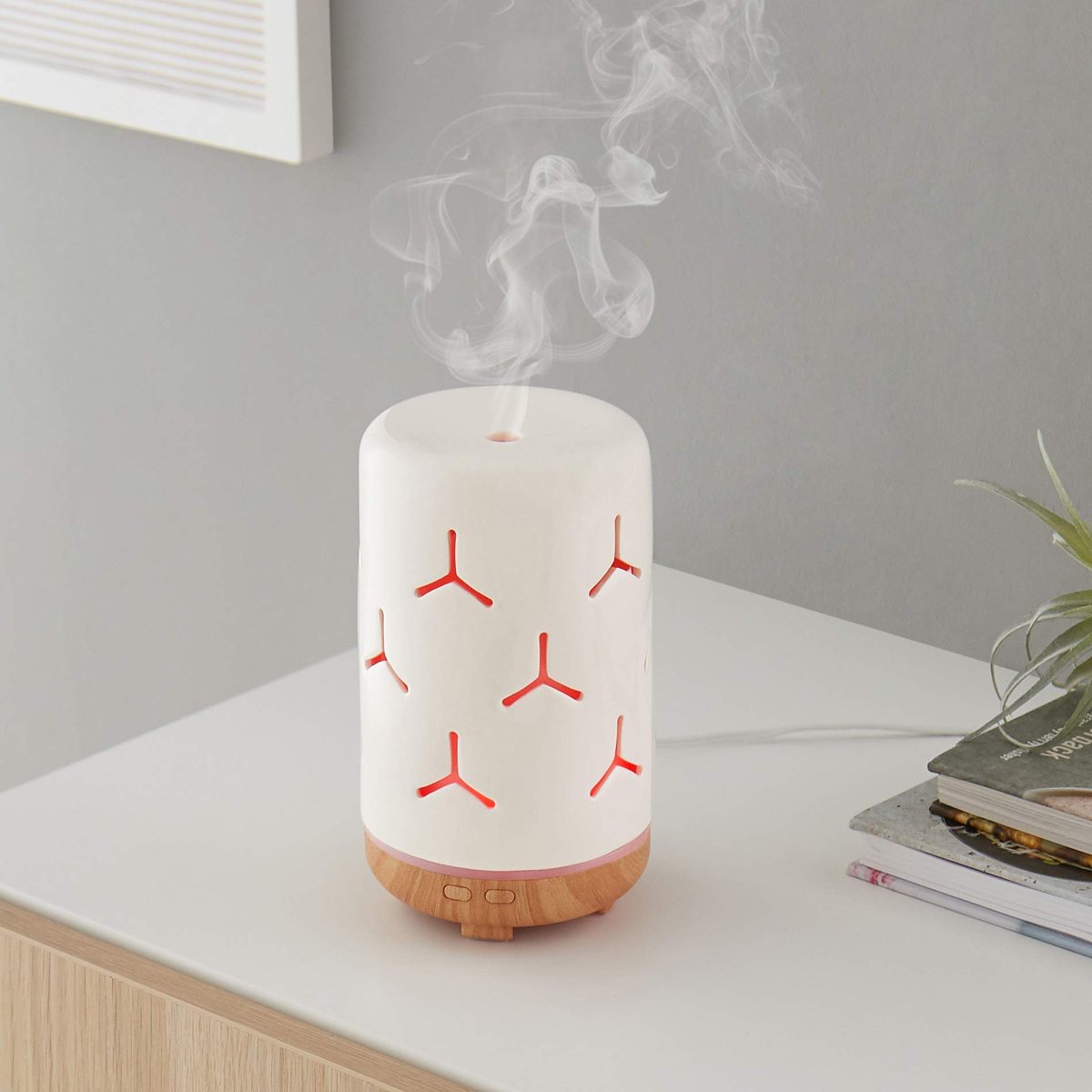 AmazonBasics 120ml Ultrasonic Ceramic Aromatherapy Essential Oil Diffuser with Wood Grain Finish Base, Snowflake Pattern
