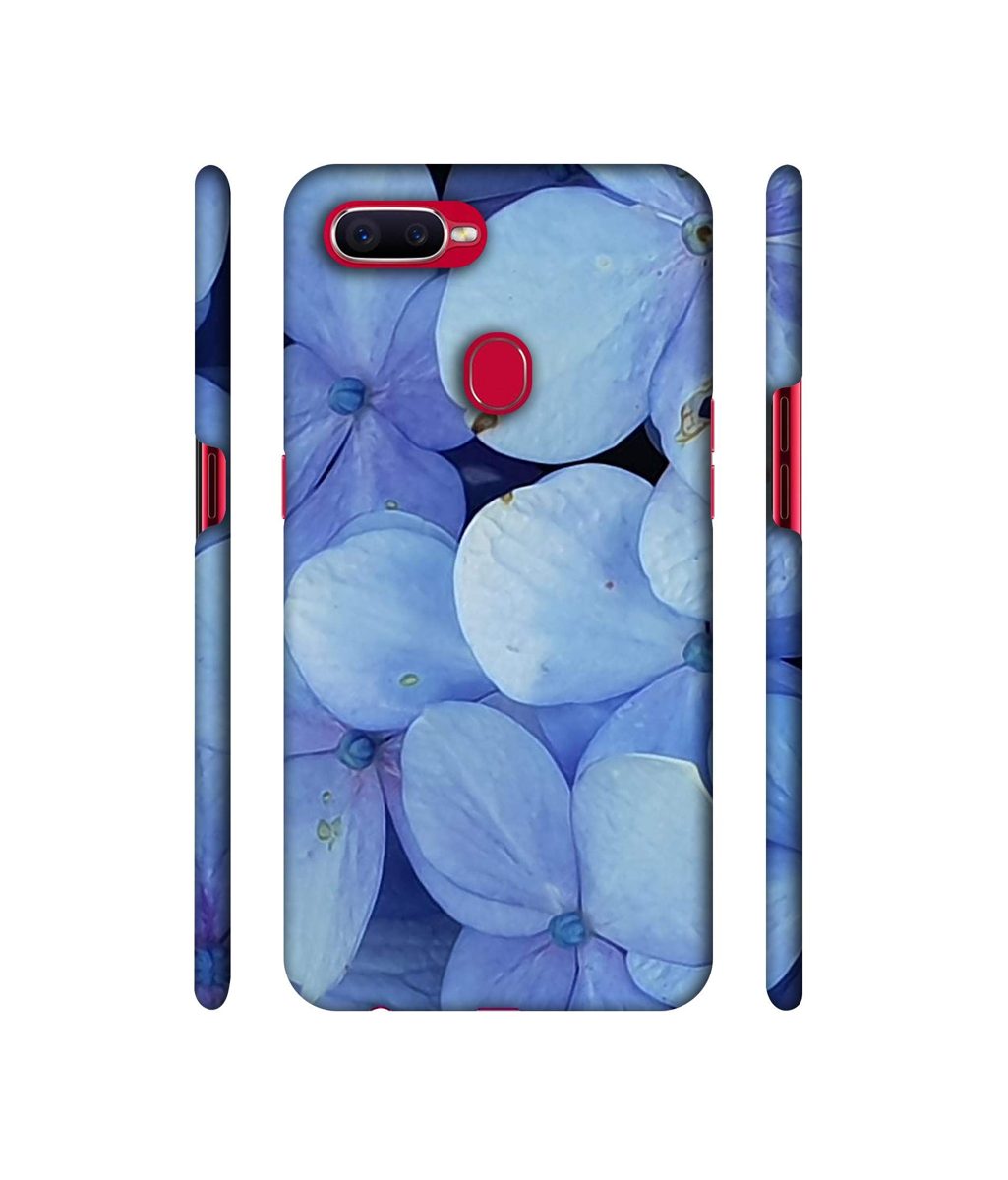 Amazon Brand - Solimo Designer Light Blue Flower Photography 3D Printed Hard Back Case Mobile Cover for Oppo F9