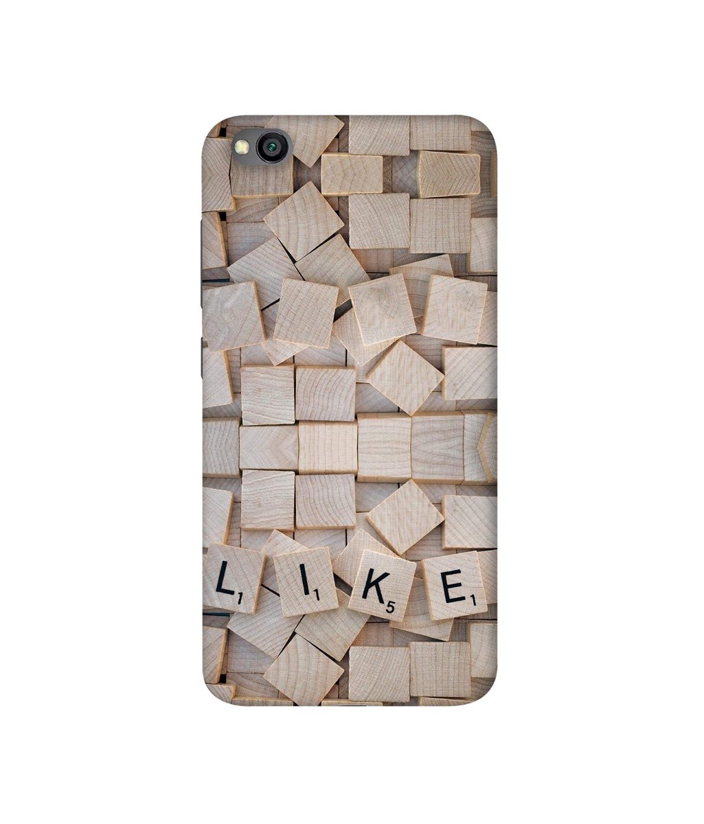 Amazon Brand - Solimo Designer Like On Wooden Block 3D Printed Hard Back Case Mobile Cover for Xiaomi Redmi Go