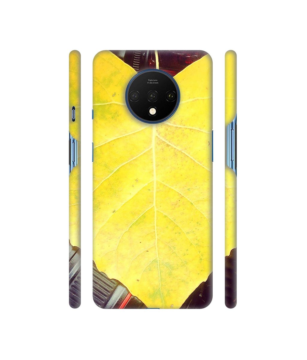 Amazon Brand - Solimo Designer Yellow Leaf 3D Printed Hard Back Case Mobile Cover for OnePlus 7T