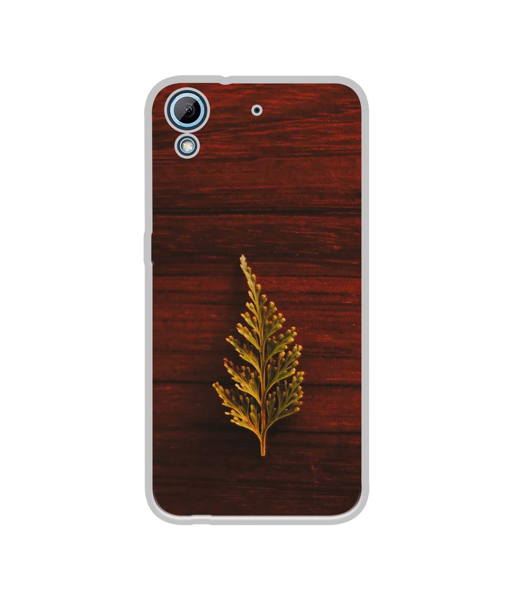 Amazon Brand - Solimo Designer Leaf on Wood UV Printed Soft Back Case Mobile Cover for HTC Desire 626/HTC Desire 628