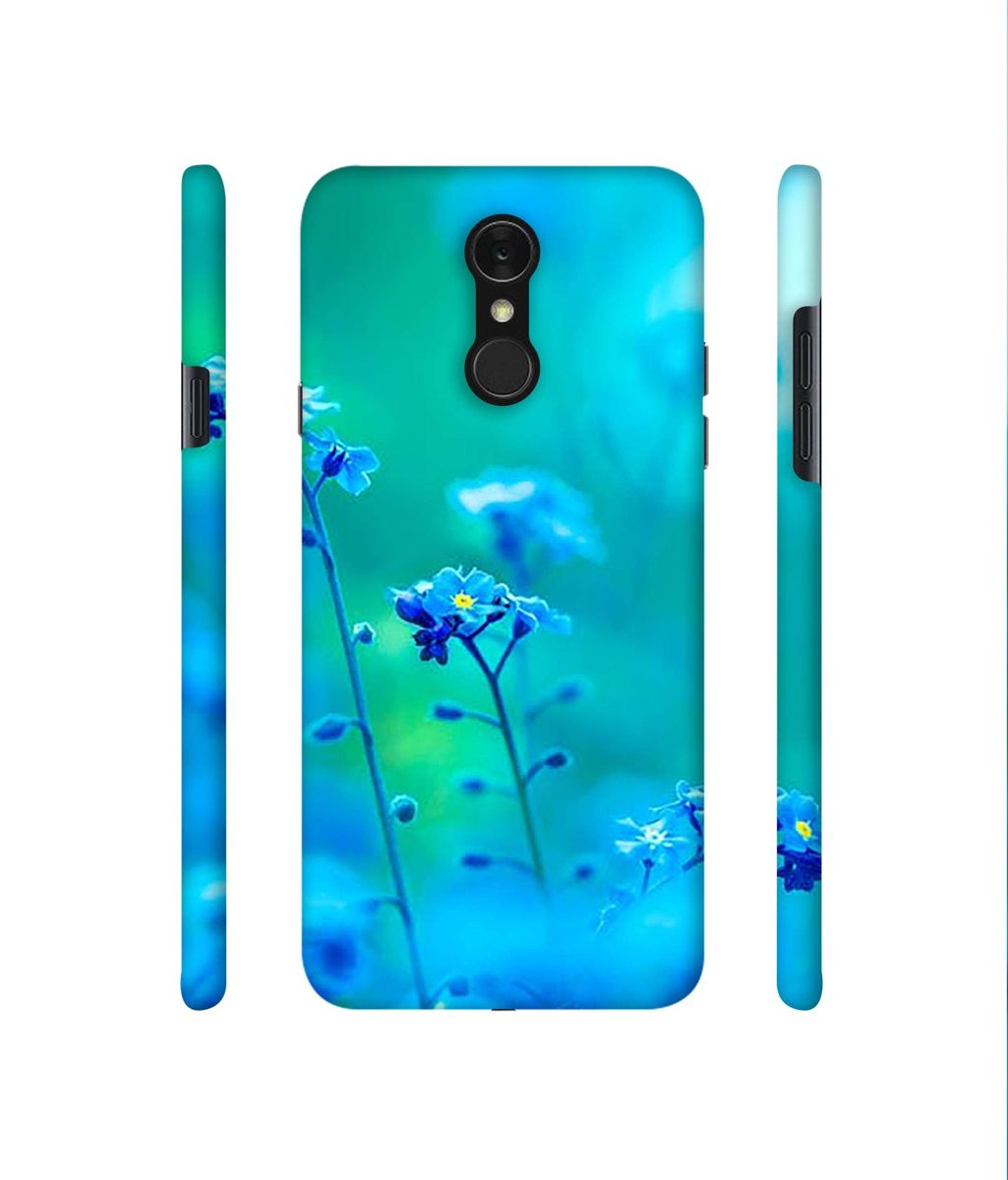 Amazon Brand - Solimo Designer Blue Flower 3D Printed Hard Back Case Mobile Cover for LG Q7